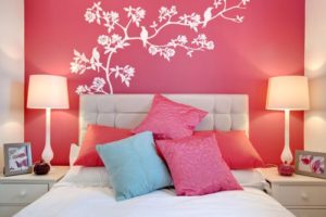 Pink walls and bed.